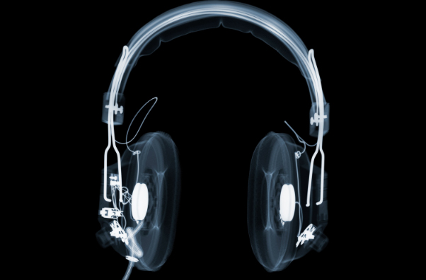 A pair of headphones on a black background
