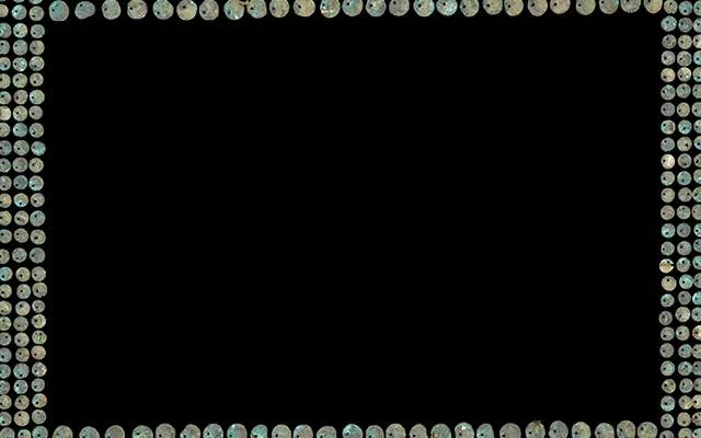 A black background with a border of small, round, greenish-colored objects.