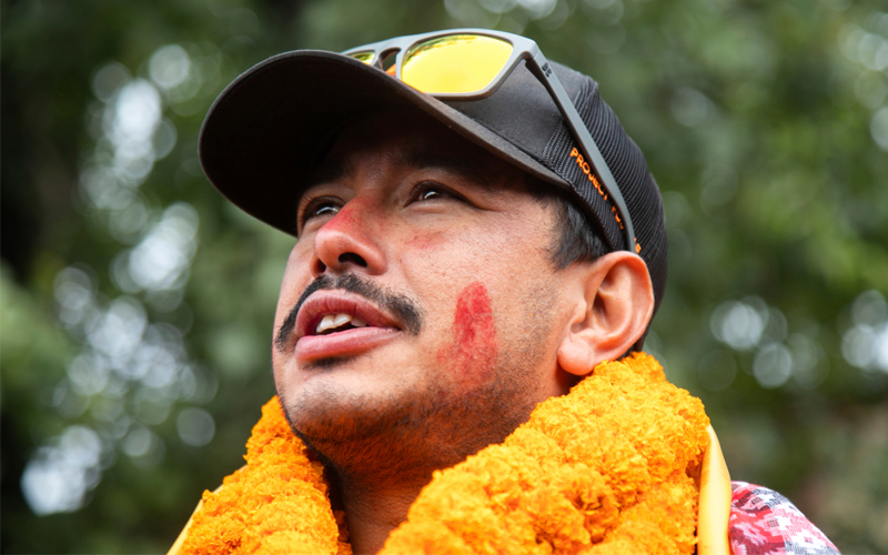 A portrait of Nims Purja