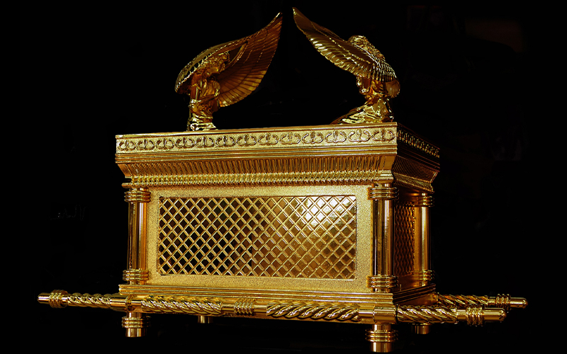 An ornately decorated and gold-covered wooden chest
